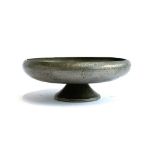 A Malayan pewter footed bowl, hammered design, 24cmD