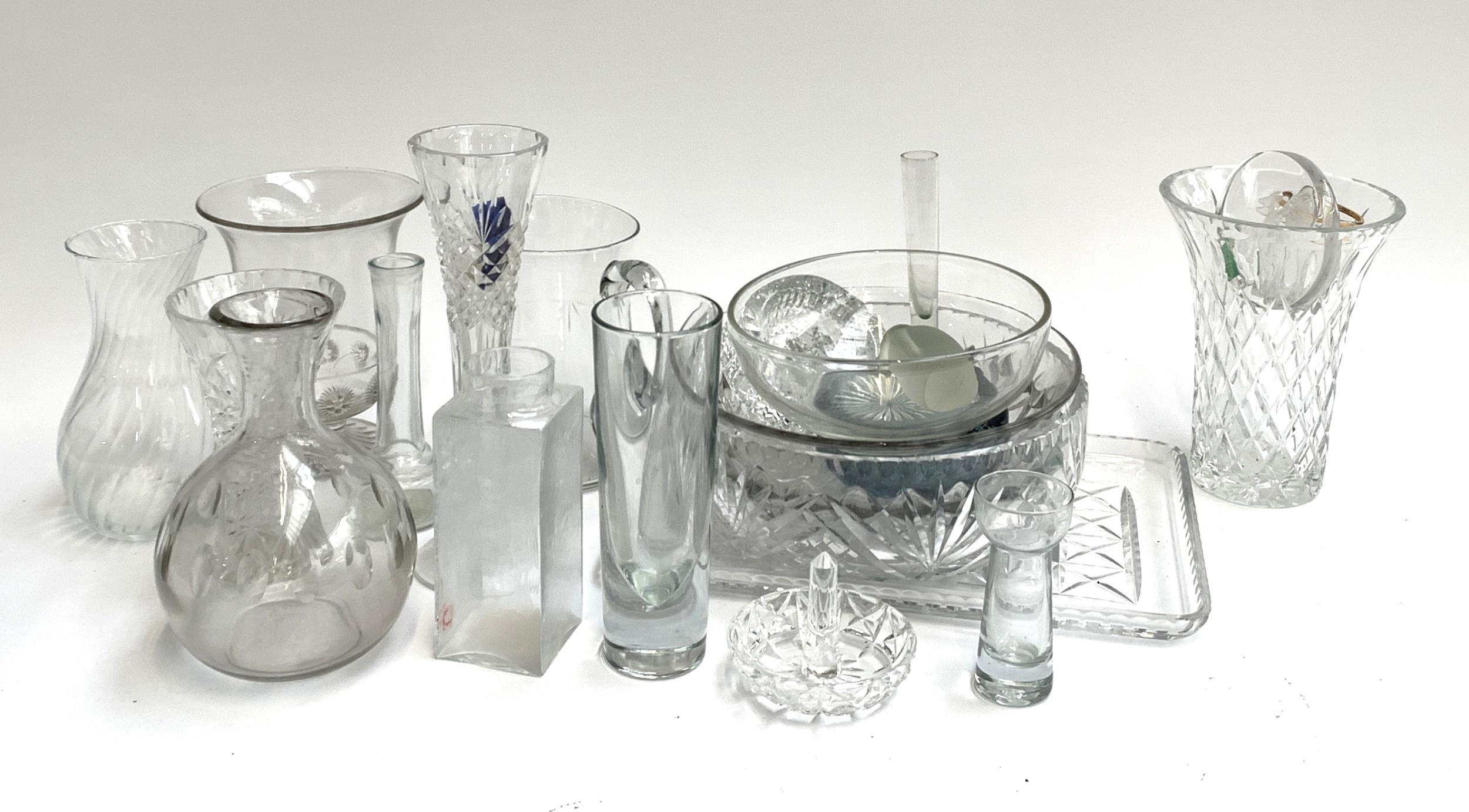 A mixed lot of glass and cut glass to include cut glass bowls, spill vases, jug etc