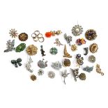 A quantity of costume brooches