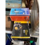 A JCB 710w power planer, in box; together with a 4 tonne hydraulic Draper jack