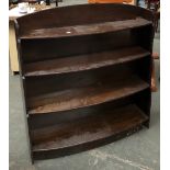 An oak bowfront graduating bookshelf of four shelves, 94cmW