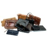 A quantity of leather bags to include vintage satchel, alligator handbag, various other ladies