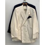 An Austin Reed navy double breasted blazer, together with an Austin Reed cream double breasted