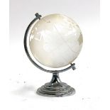 A glass spinning desk globe paperweight, on a stepped chrome base, 12cmH