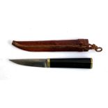 A Hackman Finland Tapio Wirkkala stainless steel hunting knife in leather sheath