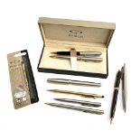 Three Parker pens, together with various others in Parker box