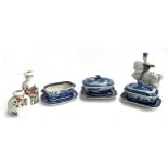 Three 18th century and later small blue and white tureens on stands, one with cover missing, a Rye