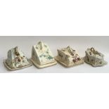 A lot of four ceramic cheese cloches, two with Greek dolphin handle, one Staffordshire