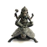 A bronze figure of Ganesh seated on a tortoise, approx. 25cmH