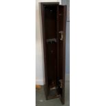 A gun cabinet, with double locks and keys, 20x20x134cmH