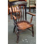 A 19th century Windsor open armchair, beech and elm, with shaped seat, turned legs and H