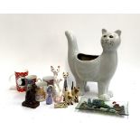 Cat Interest: A number of ceramic cat figurines, a large ceramic cat planter, 39cmH, several mugs