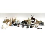 A mixed lot of figurines to include Beswick chaffinch 991, cat figures etc