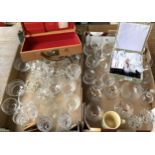 A mixed lot of etched glass champagne cups, brandy balloons, napkin rings, candlestick holders,