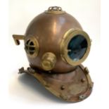 A decorative copper and brass diver's helmet, inscribed Anchor Engineering, 42cmH