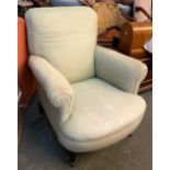 A substantial armchair, on square tapered legs and casters, approx. 83cmW