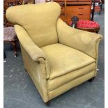 A narrow green upholstered armchair, on square tapered legs and brass capped ceramic casters, 75cmW