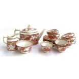 A Royal Crown Derby 'Red Aves' tea service comprising teapot, milk jug, sugar bowl, teacups (8)