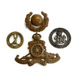 A Royal Artillery cap badge with spinning wheel, Lovats scout pin etc (4)