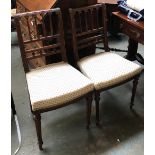 A pair decorative occasional chairs, with stuffover seats, on reeded legs