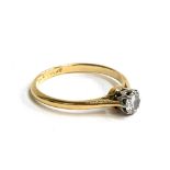 An 18ct gold ring with single moissanite in platinum setting, approx. 2.1g, size M