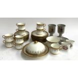 A Cauldon white and gilt part tea service with Greek key decoration to include a muffin dish,