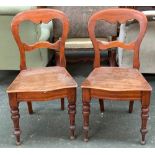 A set of four balloon back occasional chairs with solid serpentine legs