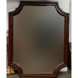 A mahogany veneer wall mirror with shaped plate, approx. 84x109cm