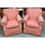A pair of 20th century armchairs, outward scrolling arms, on casters, approx. 81cmW, with loose