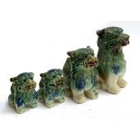 A set of four graduating stoneware glazed foo dogs, together with various other items to include