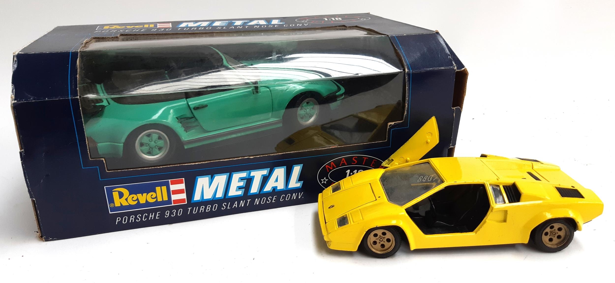 A Revell Porsche 930 Turbo 1:18 scale, boxed, together with a Lamborghini countach 1:24 scale,