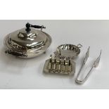 A quantity of plated items to include lidded tureen; toast rack; sugar bowl; ice tongs