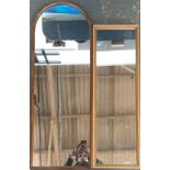 A dome top oak framed long mirror, 39x106cmH, together with a smaller mirror with gilt decoration,