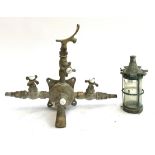 A French brass and enamel bath/shower tap and a small lantern