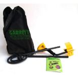 A Garrett Ace 150 metal detector in carry case