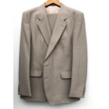 A Couture Mr Harry two piece wool mix suit, size 44R, with jacket cover