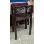A Chinese hardwood pot stand/jardiniere, with scrolling fretwork, on square section legs with