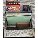 A record case containing a mixed lot of brand new, unplayed mint records from Rough Trade