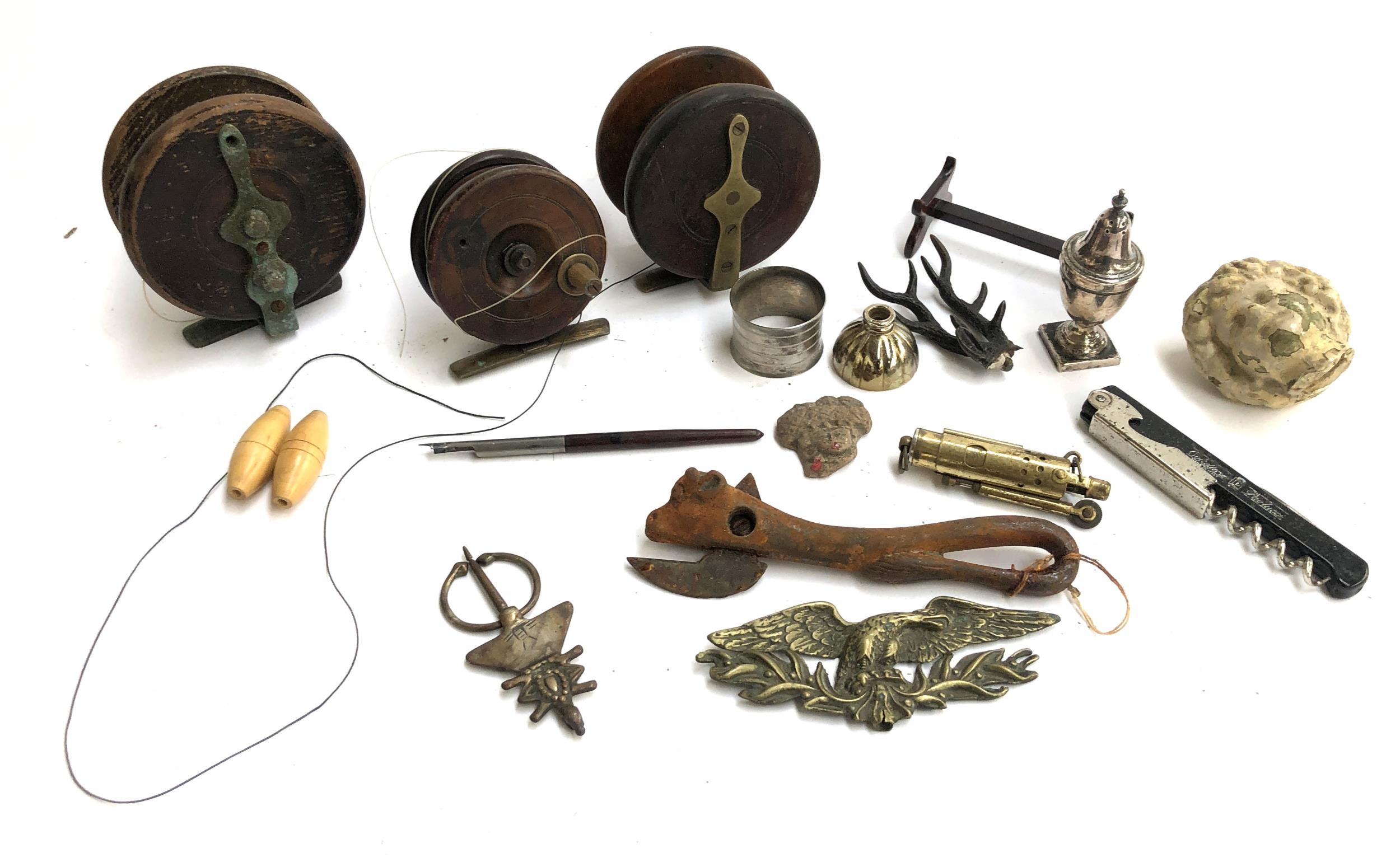 A mixed lot to include vintage fishing reels, Swiss army knife, white metal pepperette etc