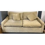 A two seater sofa bed