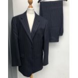 A Roderick Charles navy wool two piece pin striped suit, 36R, the trousers with turn ups and 36in