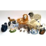 A mixed lot of animal figurines to include large Staffordshire style lion, approx. 24cmH, Szeiler,