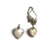 Two silver heart lockets, one with Aesthetic movement design, approx. 6g