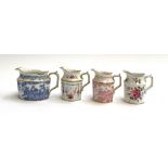 Three Royal Crown Derby cream jugs, each 8cmH; together with one other Royal Crown Derby cream