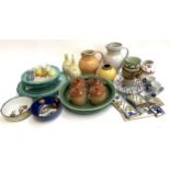 A mixed lot of continental ceramics and stoneware to include Italian donkey pattern plates,