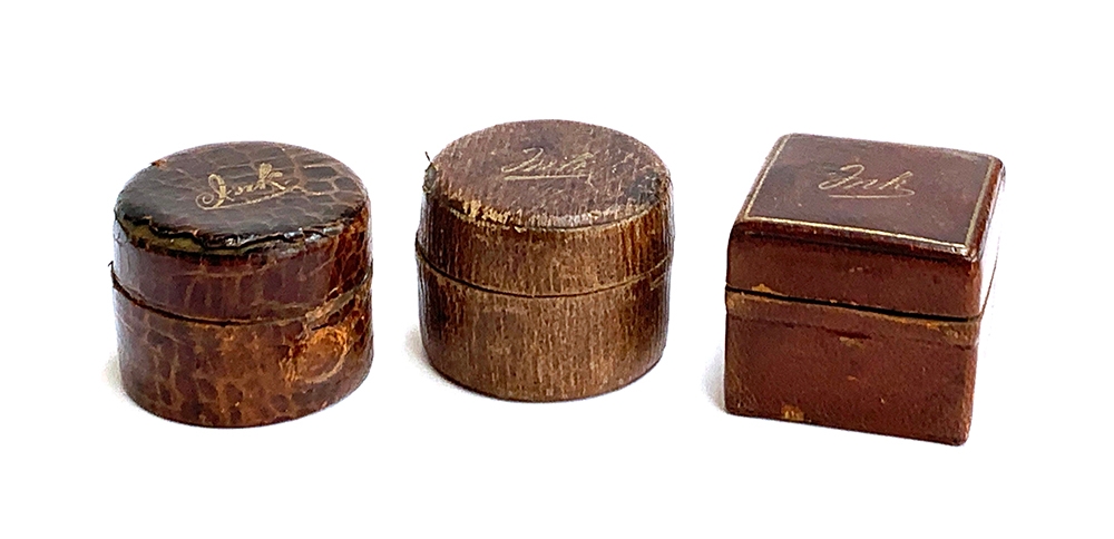 Three Victorian leather covered travelling ink wells (3)