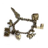 A silver charm bracelet with six charms, approx. 35g