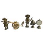 A small lot of metal items to include a cannon