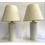 A pair of white cylindrical table lamps, height to top of fitting approx. 47.5cmH