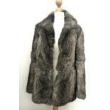 A rabbit fur jacket, approx. size 10